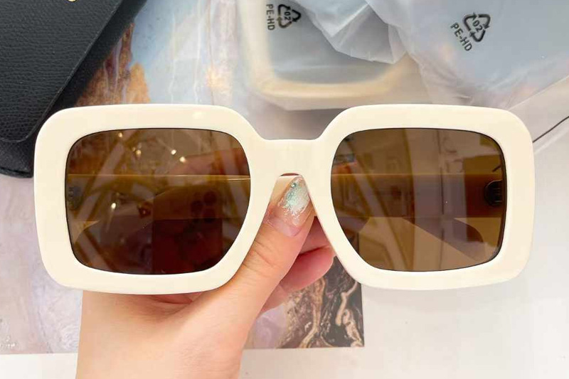 CL40304U Sunglasses Cream Brown