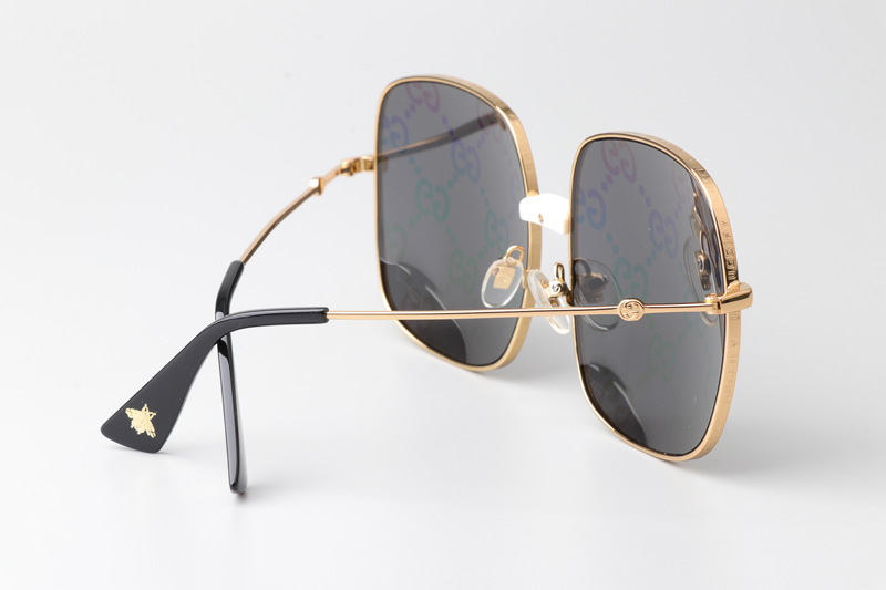 GG0414S Sunglasses Gold Gray Logo