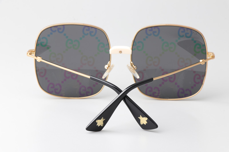 GG0414S Sunglasses Gold Gray Logo