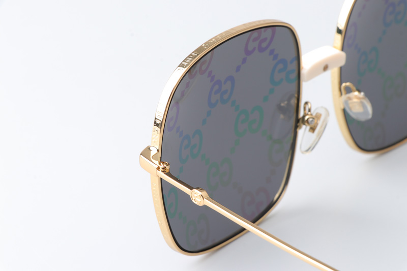 GG0414S Sunglasses Gold Gray Logo