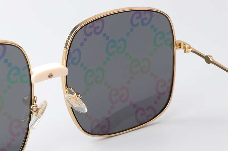 GG0414S Sunglasses Gold Gray Logo