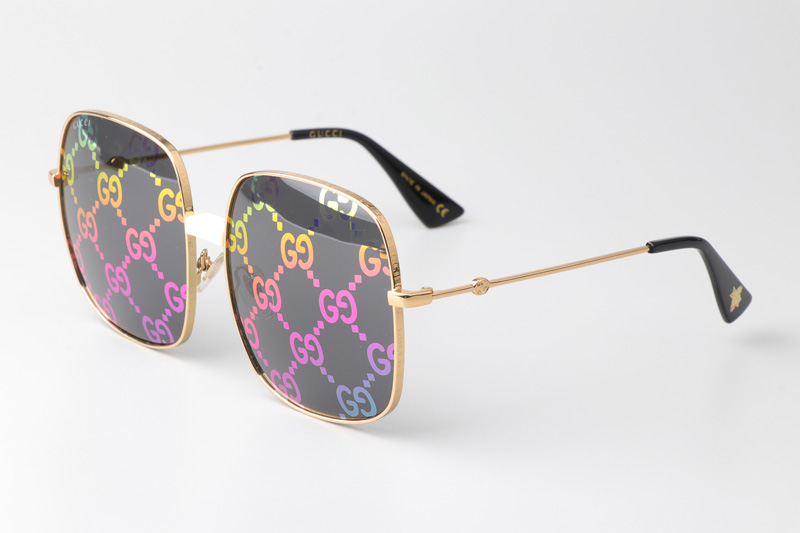 GG0414S Sunglasses Gold Gray Logo