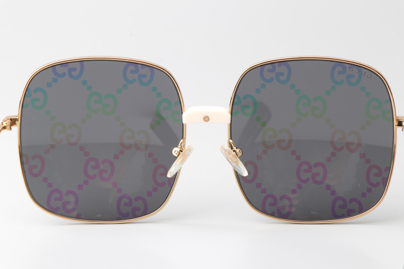 GG0414S Sunglasses Gold Gray Logo