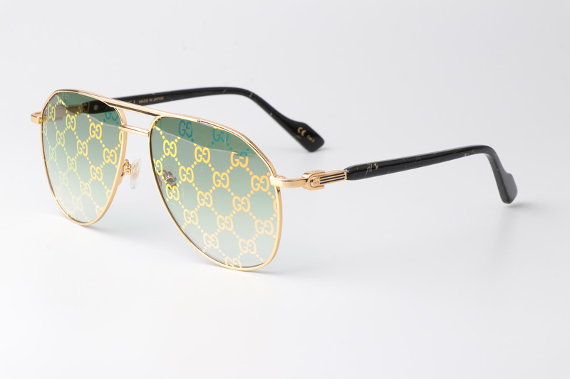 GG1220S Sunglasses Black Gold Gradient Green Logo