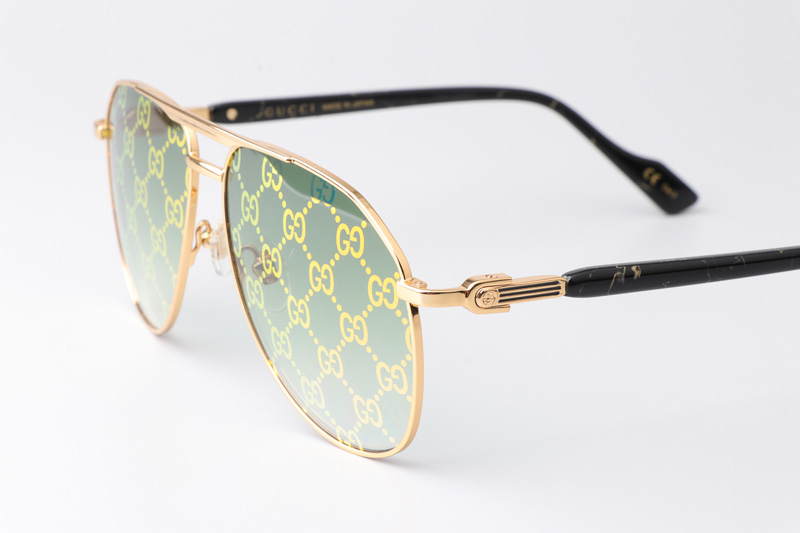 GG1220S Sunglasses Black Gold Gradient Green Logo