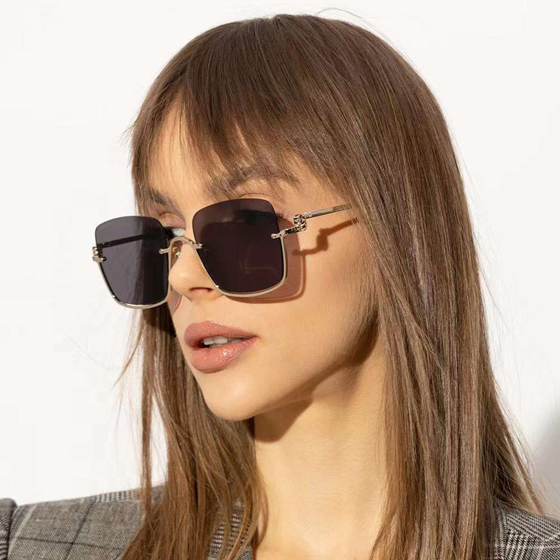 GG1279S Sunglasses Gold Gray