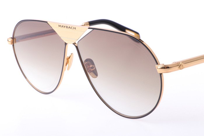 THE LINEART Sunglasses In Gold Brown